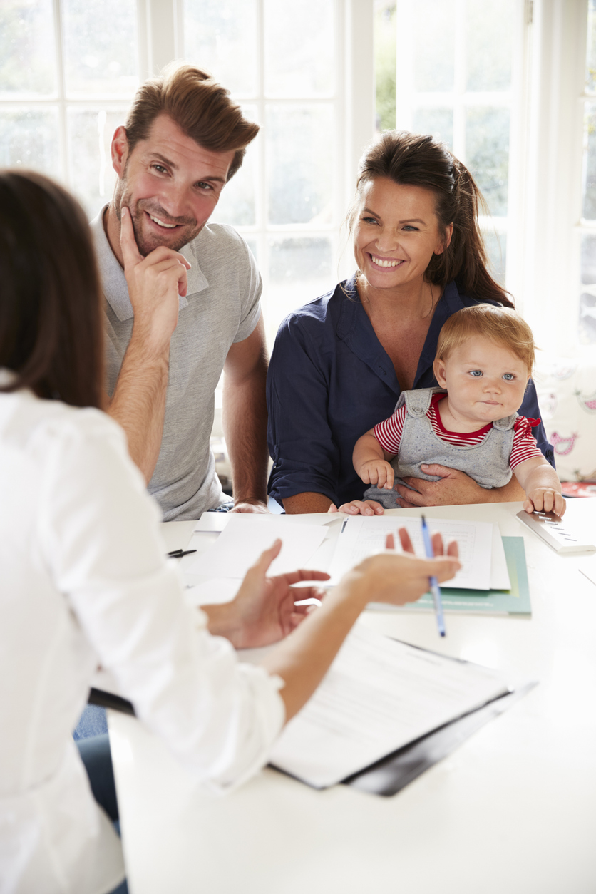 reliable-insurance-family-discussion-with-agent
